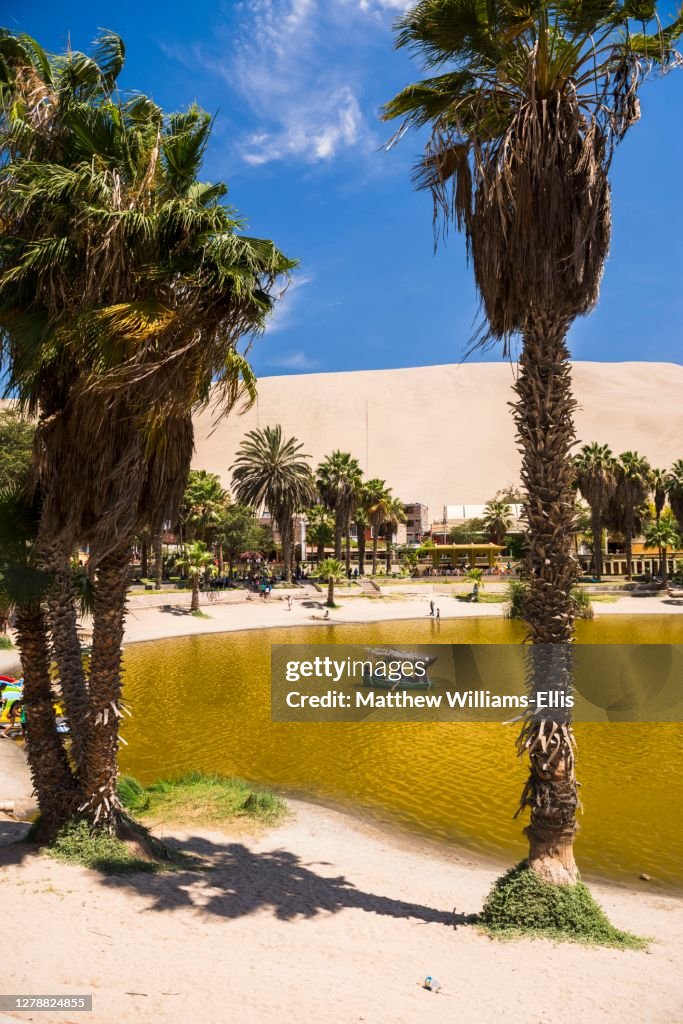 Huacachina, a sand dunes surrounded oasis village in the Ica Region of Peru, South America