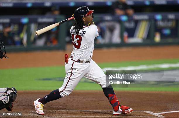 Ronald Acuna Jr. #13 of the Atlanta Braves hits a home run during the first inning against the Miami Marlins in Game One of the National League...