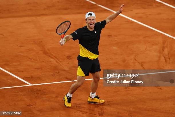 Diego Schwartzman of Argentina celebrates after winning match point during his Men's Singles quarterfinals match against Dominic Thiem of Austria on...