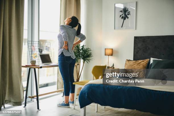 prolonged sitting and slouching contributes to back pain - cramp stock pictures, royalty-free photos & images