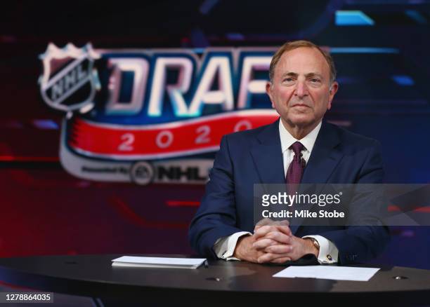 Commissioner Gary Bettman prepares for the first round of the 2020 National Hockey League Draft at the NHL Network Studio on October 06, 2020 in...