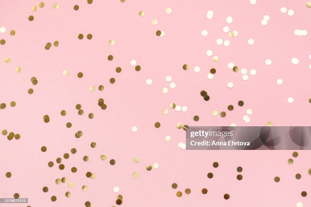 Round confetti on pink background