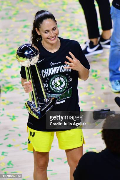 Sue Bird of the Seattle Storm celebrates after winning her fourth WNBA championship after defeating the Las Vegas Aces 92-59 during Game 3 of the...