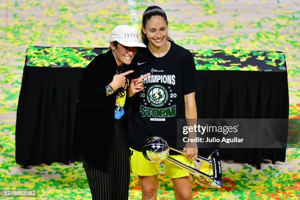 Sue Bird of the Seattle Storm poses with Megan Rapinoe after defeating the Las Vegas Aces 92-59 to win the WNBA Championship following Game 3 of the...