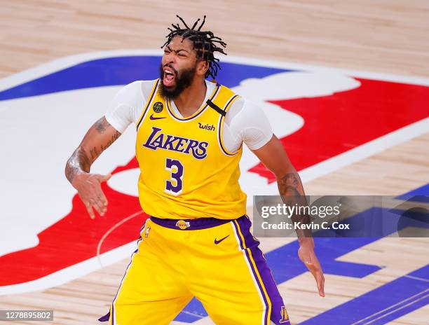 Anthony Davis of the Los Angeles Lakers reacts to a three point basket during the fourth quarter against the Miami Heat in Game Four of the 2020 NBA...