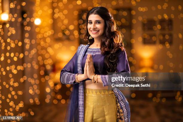 young woman diwali celebration - stock photo - namaste greeting stock pictures, royalty-free photos & images