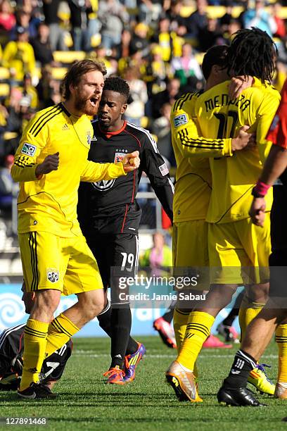 Eddie Gaven and Andres Mendoza of the Columbus Crew celebrate the Crew's first goal in a 2-1 win over D.C. United on October 2, 2011 at Crew Stadium...