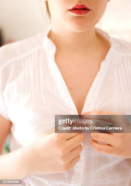 hardest button to button - dekolleté stock-fotos und bilder