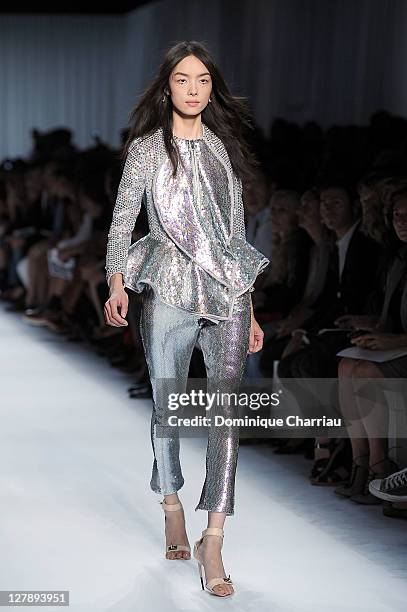 Model walks the runway during the Givenchy Ready to Wear Spring / Summer 2012 show during Paris Fashion Week on October 2, 2011 in Paris, France.