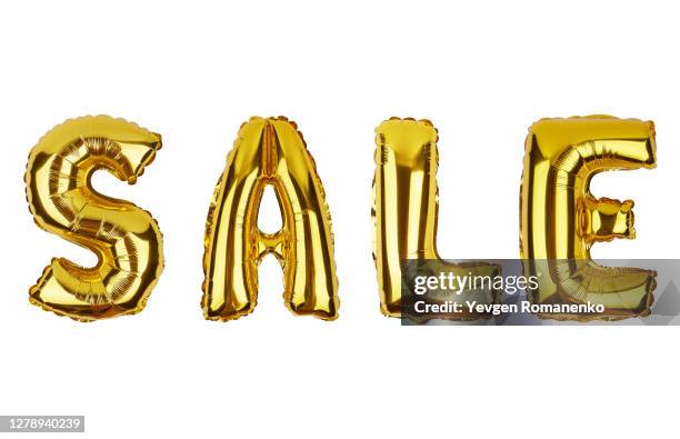 sale word made of foil balloons isolated on white background - gold font stock pictures, royalty-free photos & images