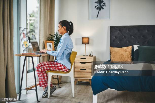 the work from home era is here - pajamas stock pictures, royalty-free photos & images