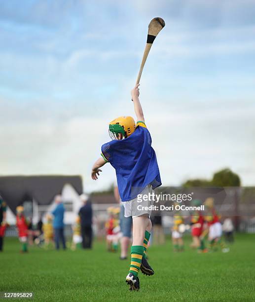 jumping for the sliother - hurling ireland stock pictures, royalty-free photos & images
