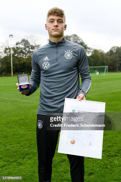 Luca Netz presents his medal at Sport School Wedau on October 07, 2020 in Duisburg, Germany.
