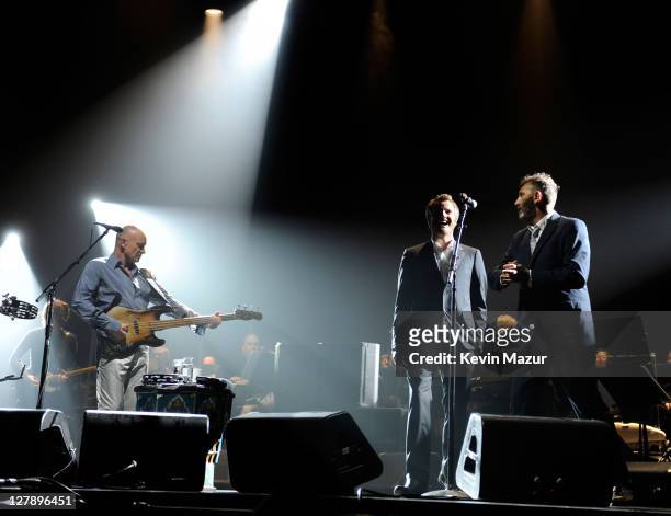 Sting and Joe Sumner perform on stage during STING: 25th Anniversary/60th Birthday Concert to Benefit Robin Hood Foundation at Beacon Theatre on...