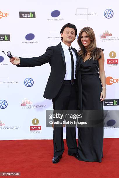 Singer Vittorio Grigolo and Roshi Mamdar attend the Echo Klassik 2011 award ceremony at Konzerthaus am Gendarmenmarkt on October 2, 2011 in Berlin,...