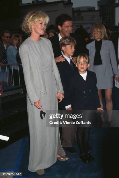 Actress Melanie Griffith, actor Antonio Banderas, Melanie's daughter Dakota Johnson and Melanie's son Alexander Bauer attend the "Batman & Robin"...