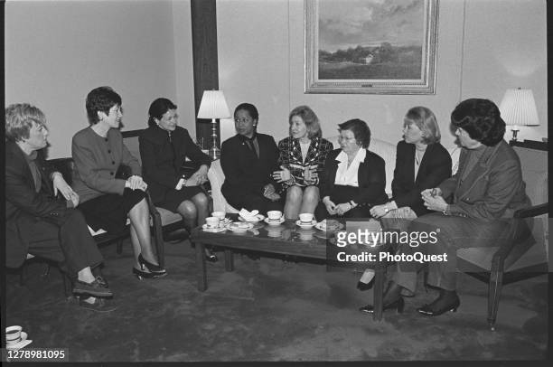 View of a group of female US Senators as they talk, seated around a coffee table, Washington DC, January 1997. Pictured are, from left, Senators...