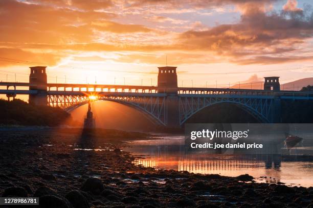 britannia bridge, menai strait, anglesey, wales - menai straits stock pictures, royalty-free photos & images