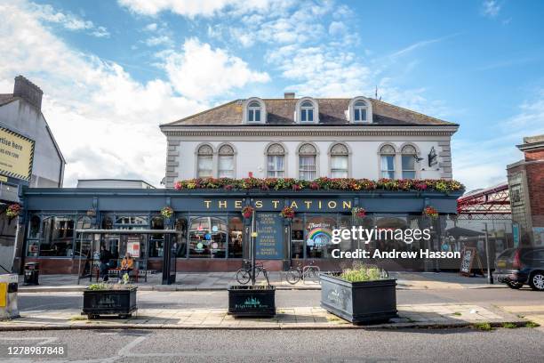 The Station pub in Hove on October 7, 2020 in Brighton, England. The nationwide pub chain, Greene King has announced 800 job losses due to the 10pm...