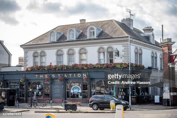 The Station pub in Hove on October 7, 2020 in Brighton, England. The nationwide pub chain, Greene King has announced 800 job losses due to the 10pm...