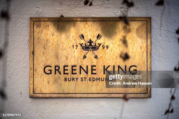 Greene King sign on the Sussex Arms in The Lanes, Brighton on October 7, 2020 in Brighton, England. The nationwide pub chain, Greene King has...