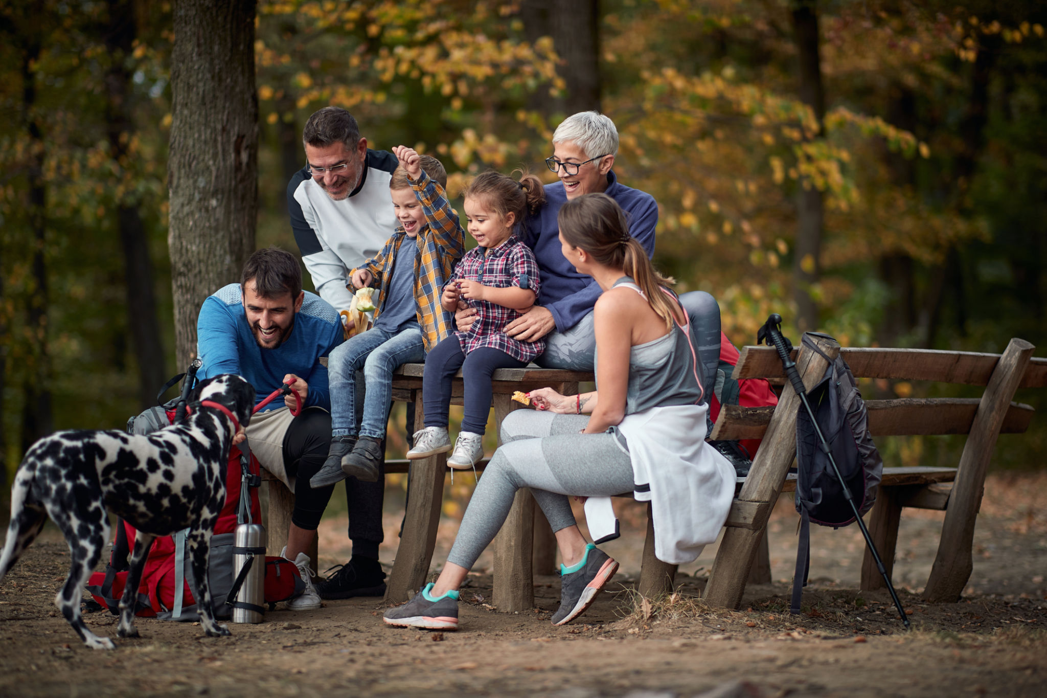 family hiking dog