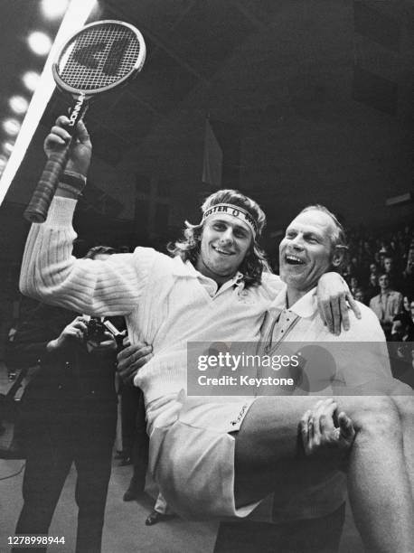 Bjorn Borg of Sweden celebrates with team captain Lennart Bergelin after defeating Jan Kodes of Czechoslavakia during the Men's Singles match to win...