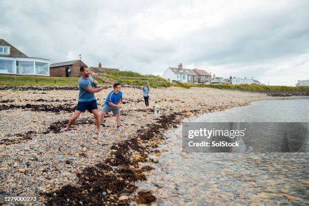 Girl Throwing Pebbles Photos and Premium High Res Pictures - Getty Images