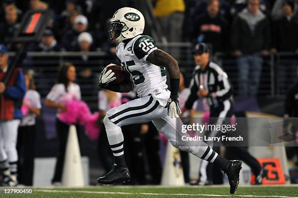 Joe McKnight of the New York Jets returns a kickoff for a touchdown against the Baltimore Ravens at M&T Bank Stadium on October 2. 2011 in Baltimore,...