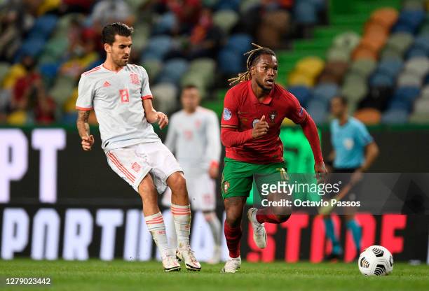 Renato Sanches of Portugal beats Dani Ceballos of Spain for the ball during the international friendly match between Portugal and Spain at Estadio...