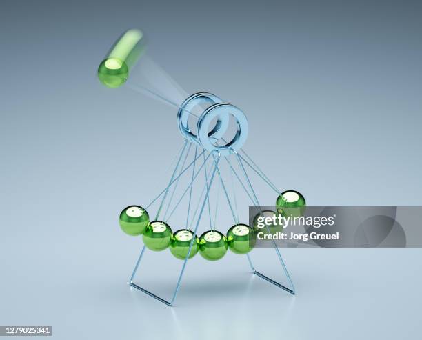 circular newton's cradle - perpetual motion stock pictures, royalty-free photos & images