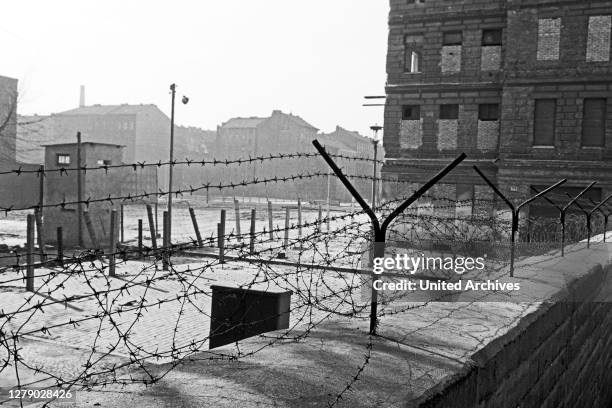 Wall and border facilities near Bernauer Strasse street in Berlin, Germany 1963.