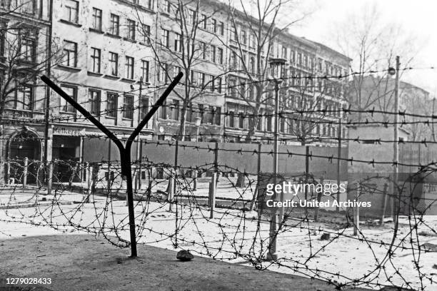 Wall and border facilities near Bernauer Strasse street in Berlin, Germany 1963.