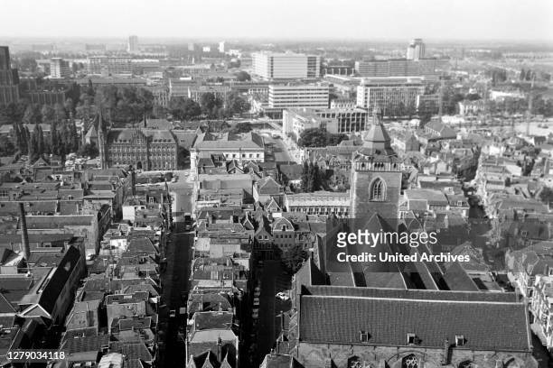 View from the belfry of Saint Martinus cathedral to the Buur church and the city of Utrecht, The Netherlands 1971.