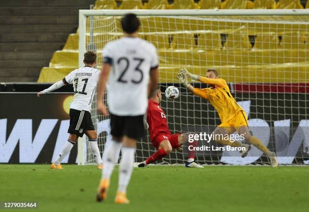 Luca Waldschmidt of Germany scores his team's third goal during the international friendly match between Germany and Turkey at RheinEnergieStadion on...