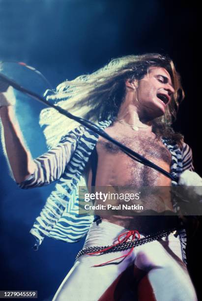 American Rock musician David Lee Roth, of the group Van Halen, performs onstage at the Aragon Ballroom, Chicago, Illinois, April 26, 1979.