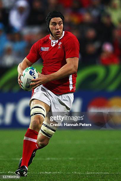 Ryan Jones of Wales runs with the ball during the IRB Rugby World Cup Pool D match between Wales and Fiji at Waikato Stadium on October 2, 2011 in...