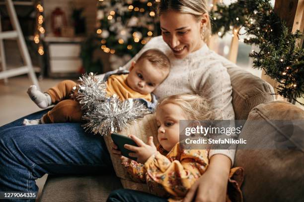 my world - christmas family stock pictures, royalty-free photos & images