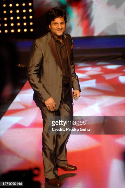 Fardeen Khan walks the ramp at the Gitanjali's 'Bollywood Nite' show on August 20, 2010 in Mumbai, India.
