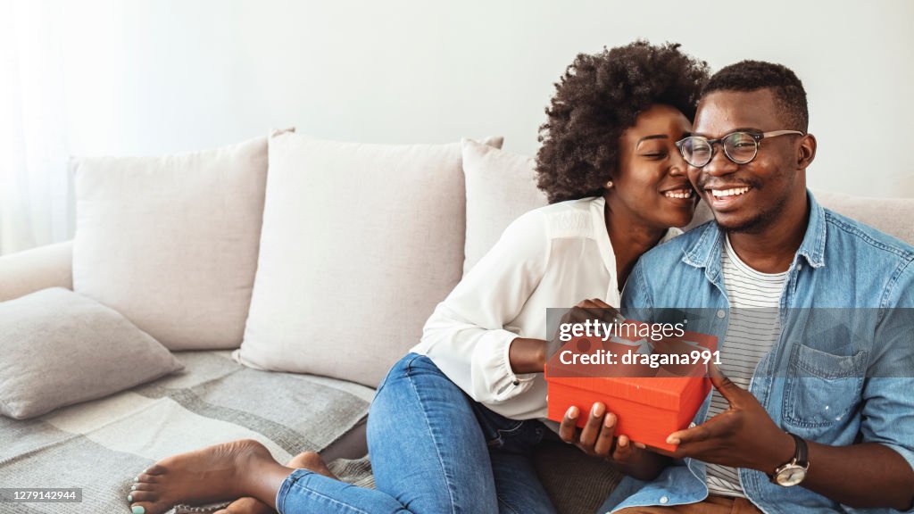 Romantic couple with present.