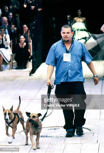 British fashion designer Alexander McQueen walks the runway during the Alexander McQueen Ready to Spring/Summer 1999 fashion show as part of the...