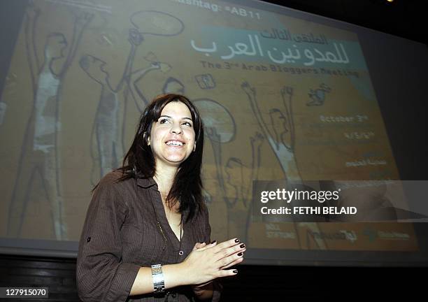 Tunisia's famous blogger Lina Ben Mhenni, who has been tipped for the 2011 Nobel Peace Prize nominations, gestures during the third Arab Bloggers...