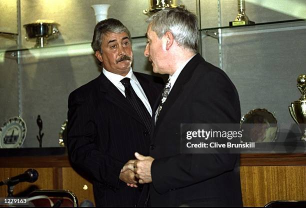 End of an era at Anfield as an emotional Roy Evans shakes hands with Liverpool chairman David Moores on the day he leaves the club after 33 years of...