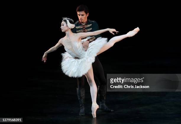 Akane Takada and Federico Bonelli perform Swan Lake , Act II Pas de deux during the "The Royal Ballet: Back on Stage" photocall at The Royal Opera...