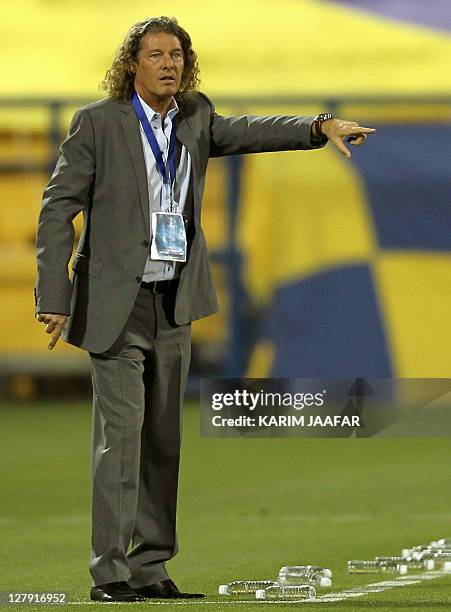Bruno Metsu, coach of Qatar's Al-Gharrafa, gestures during his team's AFC Champions League group A football match against Iran's Sepahan at...