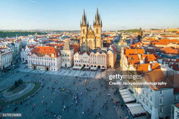 aerial shot of old town square in prague, shot from prague astronomical clock tower in czech republic - prague old town square stock pictures, royalty-free photos & images