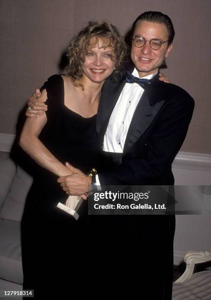 Actress Michelle Pfeiffer and actor Fisher Stevens attend the 47th Annual Golden Globe Awards on January 20, 1990 at Beverly Hilton Hotel in Beverly...