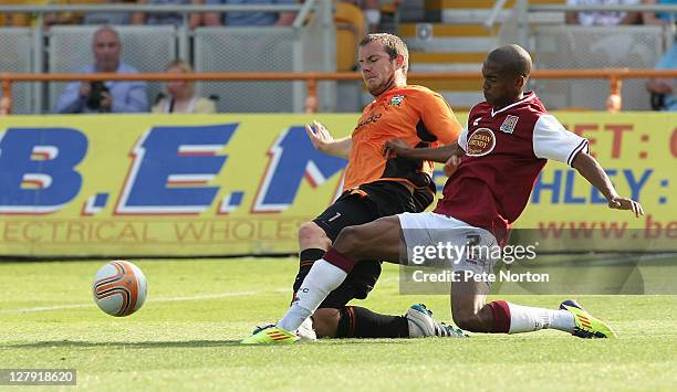 Lewis Young of Northampton Town challenges for the ball with Gary Borrowdale of Barnet during the npower League Two match between Barnet and...