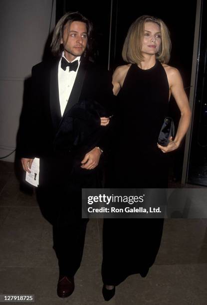 Actor Fisher Stevens and actress Michelle Pfeiffer attend the 49th Annual Golden Globe Awards on January 18, 1992 at Beverly Hilton Hotel in Beverly...