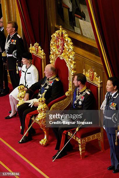 Queen Sonja of Norway, King Harald V of Norway and Prince Haakon of Norway at Storting on October 3, 2011 in Oslo, Norway.